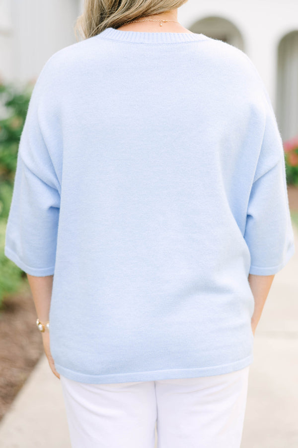 Plus Size light blue oversized cardigan with short sleeves and pearl button-down front.