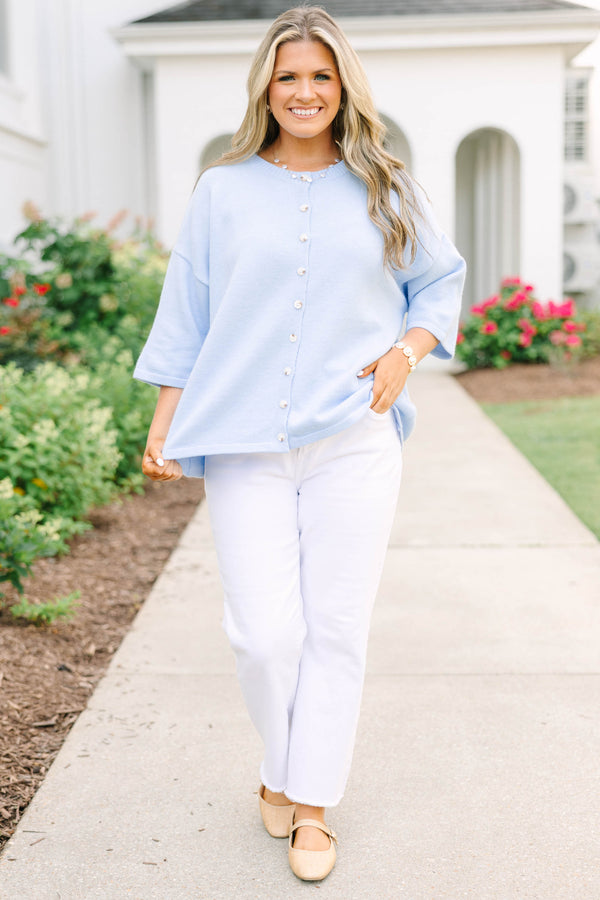 Plus Size light blue oversized cardigan with short sleeves and pearl button-down front.