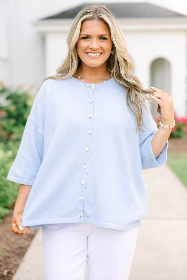 Plus Size light blue oversized cardigan with short sleeves and pearl button-down front.