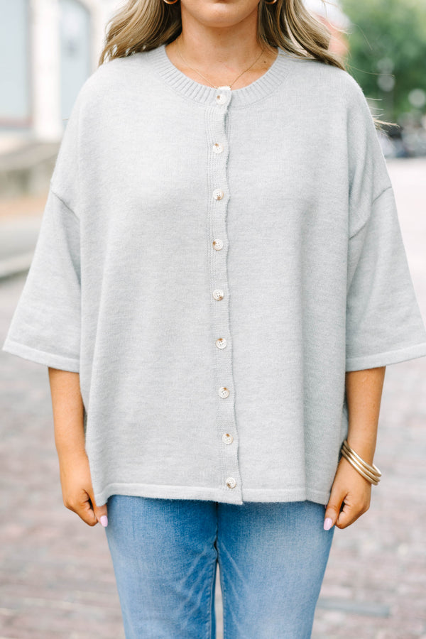 Plus Size heather gray knit cardigan with a round neckline, button-down front, and 3/4 sleeves.