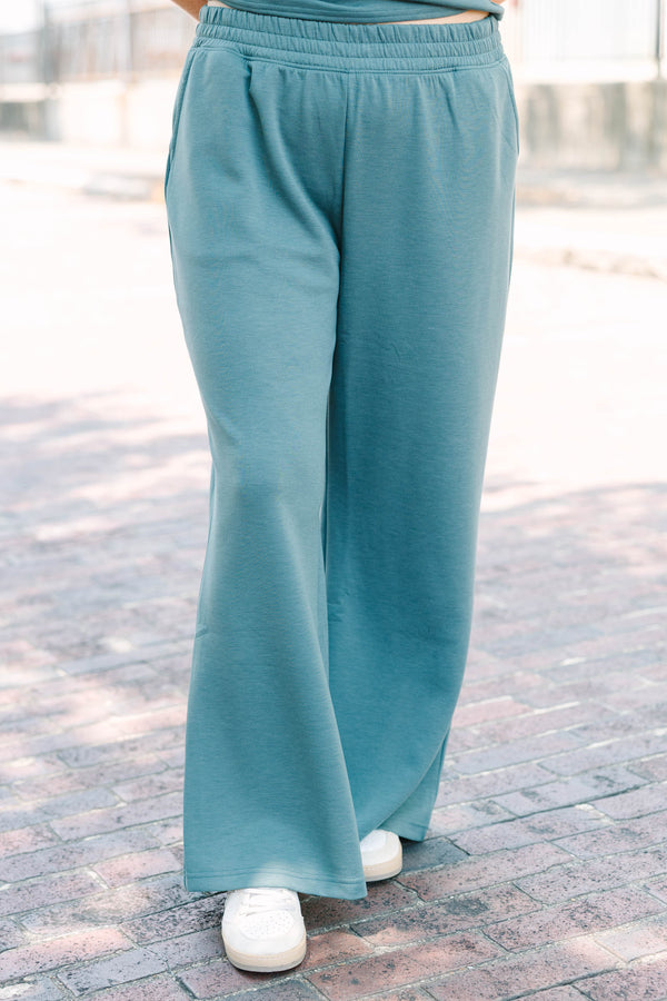 Plus Size ash jade two-piece set featuring a short sleeve crewneck top and wide-leg pants.