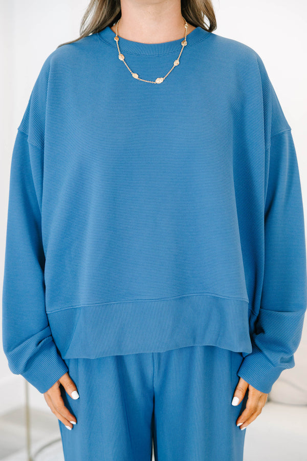 Plus Size slate blue ribbed loungewear set with a long sleeve crewneck top and wide-leg pants.