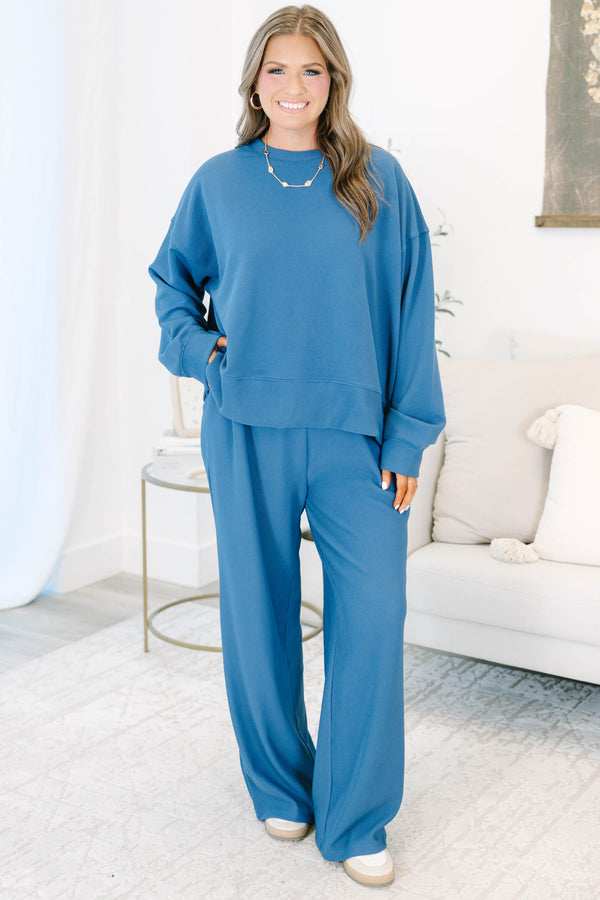 Plus Size slate blue ribbed loungewear set with a long sleeve crewneck top and wide-leg pants.