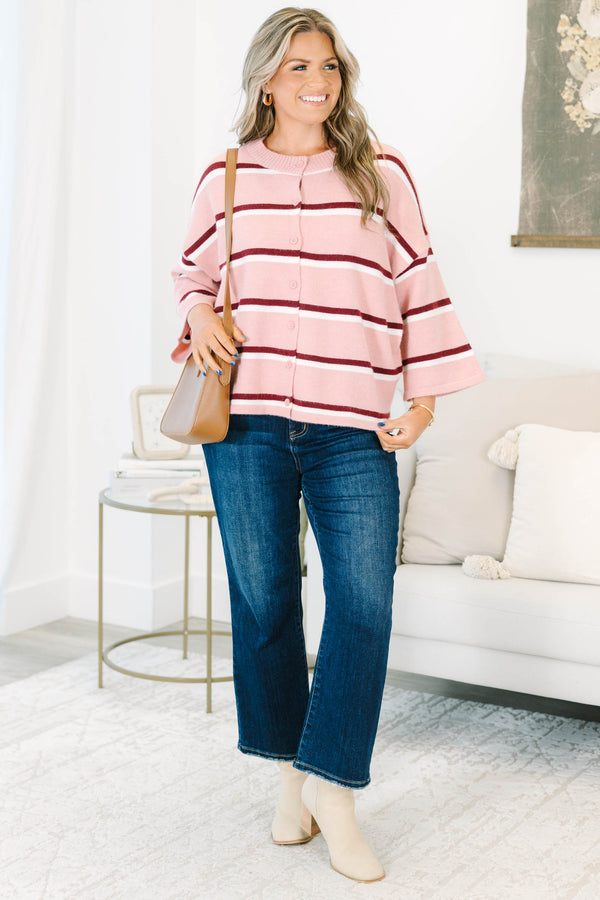 Plus size pink striped cardigan with a relaxed fit, button-down front, and soft knit fabric.