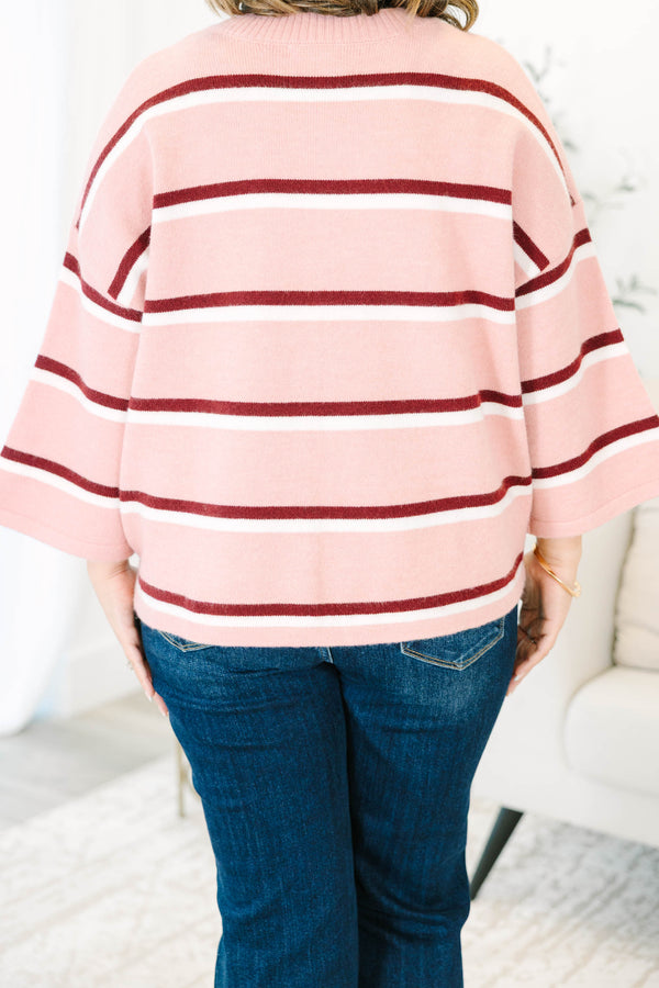 Plus size pink striped cardigan with a relaxed fit, button-down front, and soft knit fabric.