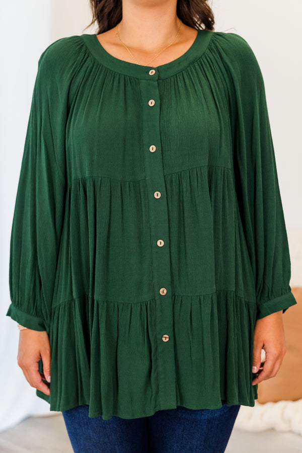 Chic Soul plus size clothing, forest green long sleeve button up top with round neckline with cuff sleeves and ruffle tiered detailing with button detail on sleeve