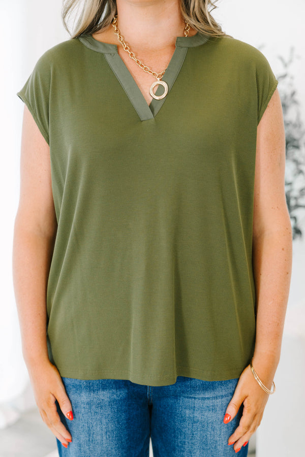 Plus Size olive cap sleeve top with a notched neckline and soft microribbed texture.