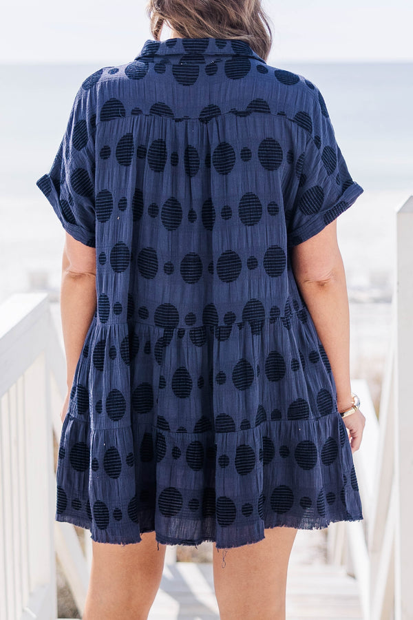 Chic Soul plus size clothing, navy short sleeve mini dress with tiers and v neck with black circle patter and cuff sleeves