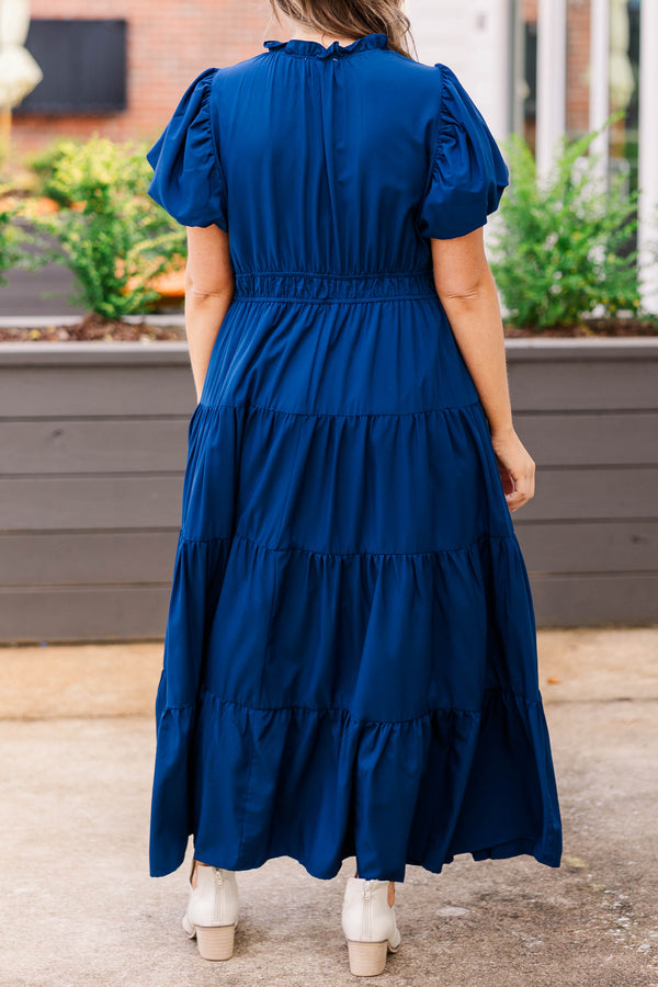 Chic Soul plus size clothing, navy colored midi length dress with puffy short sleeves and sinches at the waist and 4 ruffle details