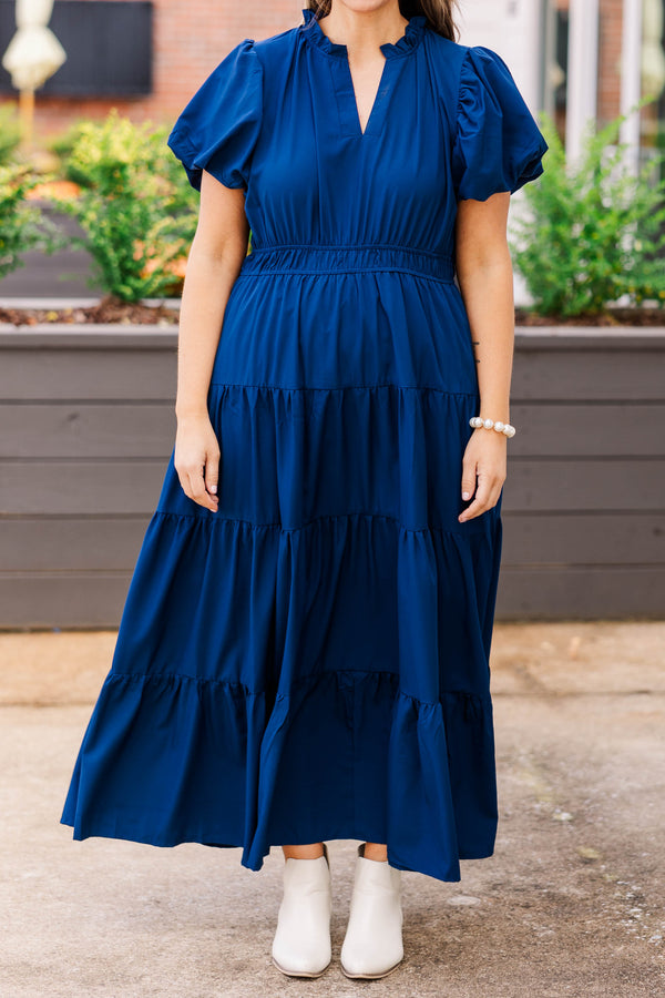 Chic Soul plus size clothing, navy colored midi length dress with puffy short sleeves and sinches at the waist and 4 ruffle details