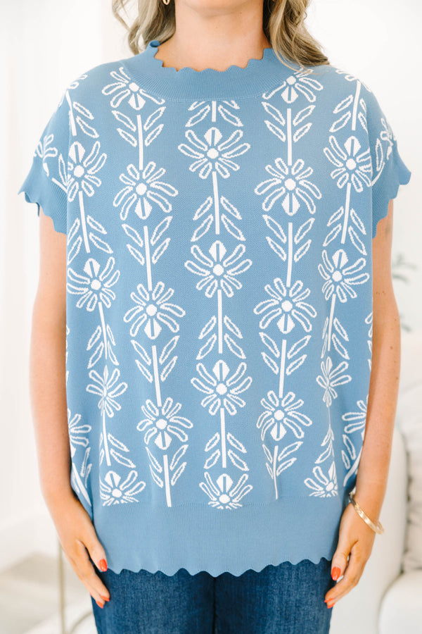 Plus Size slate blue short sleeve sweater with a white floral pattern and scalloped neckline.