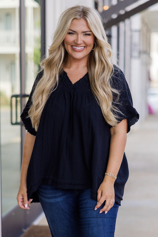Plus Size black gauzy V-neck top with short sleeves and frayed hemlines.