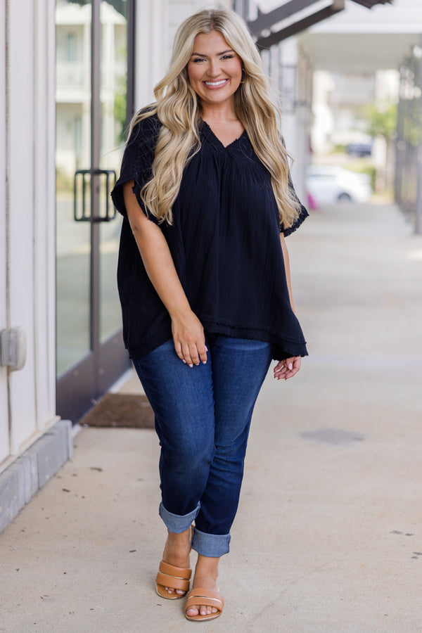 Plus Size black gauzy V-neck top with short sleeves and frayed hemlines.