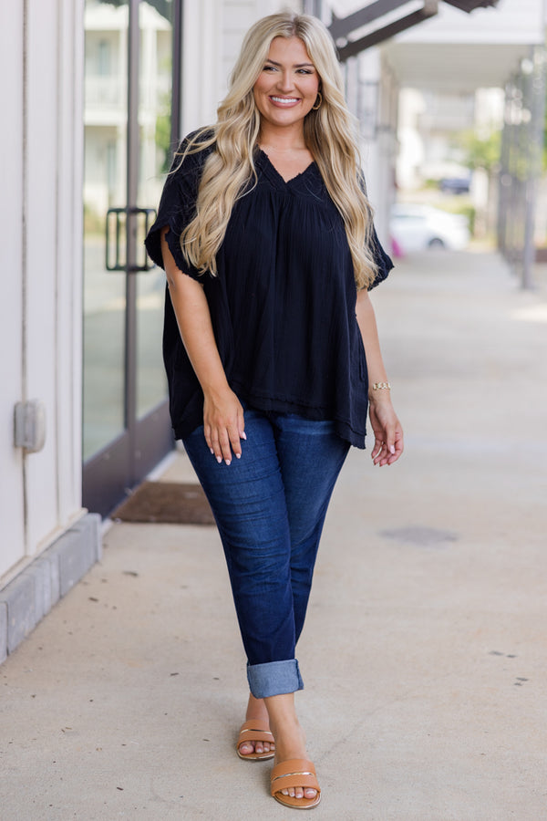 Plus Size black gauzy V-neck top with short sleeves and frayed hemlines.