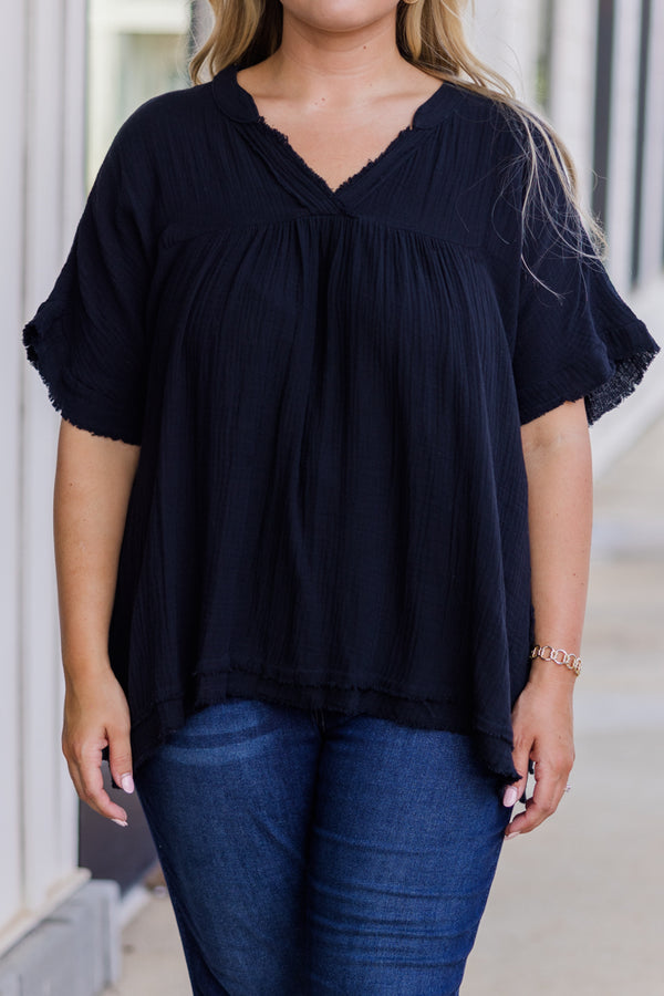 Plus Size black gauzy V-neck top with short sleeves and frayed hemlines.