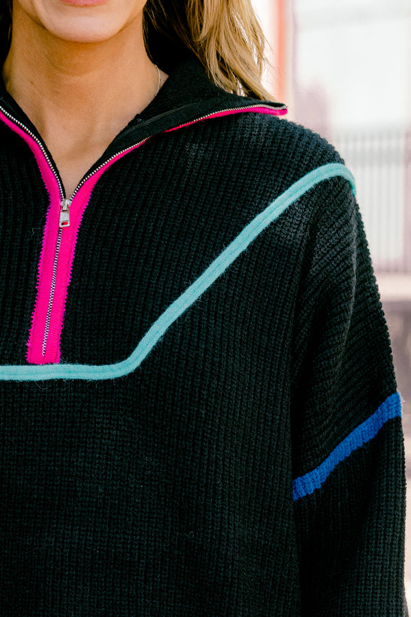 Plus Size black knit quarter-zip sweater with vibrant multi-colored piping and orange cuffs.