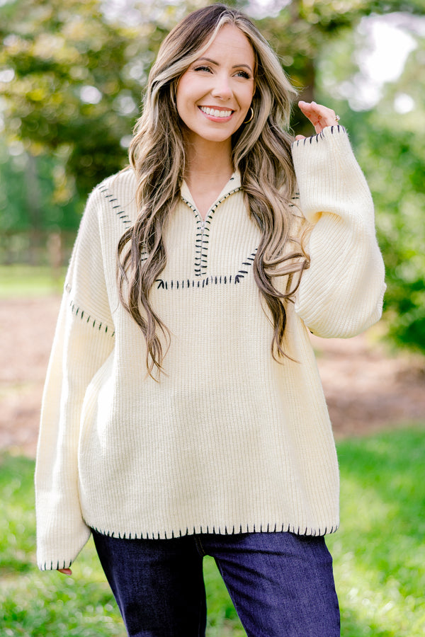 Chic Soul plus size clothing, cream quarter zip sweater with black embroidery detailing on the hem, sleeves, and neckline