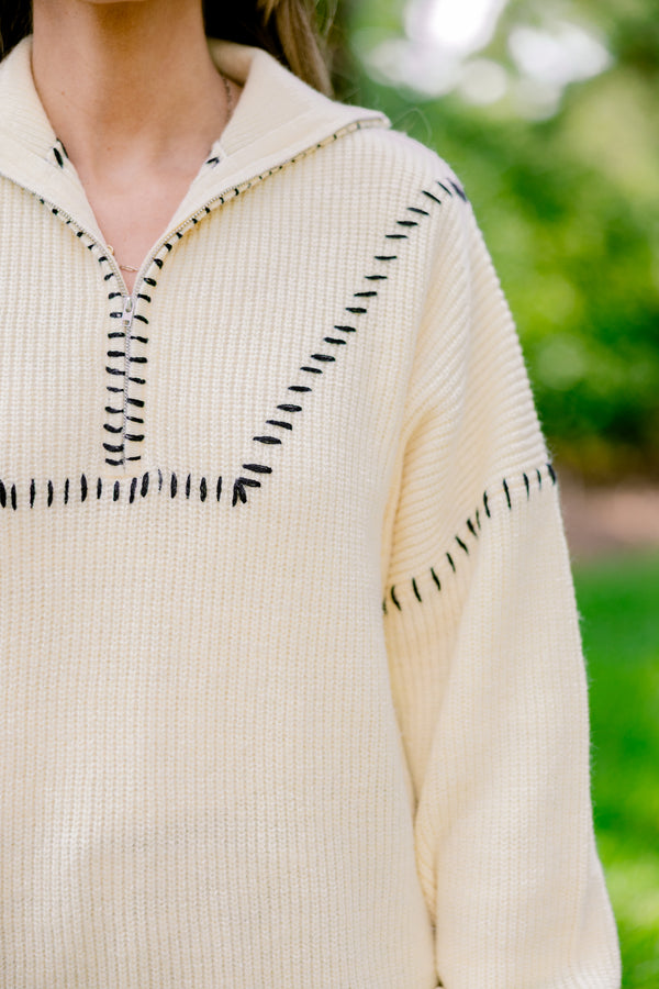 Chic Soul plus size clothing, cream quarter zip sweater with black embroidery detailing on the hem, sleeves, and neckline