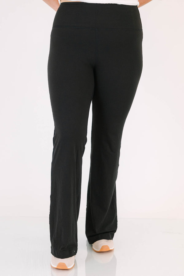 Plus Size black flare leggings in a butter soft fabric with a high-waisted fit.