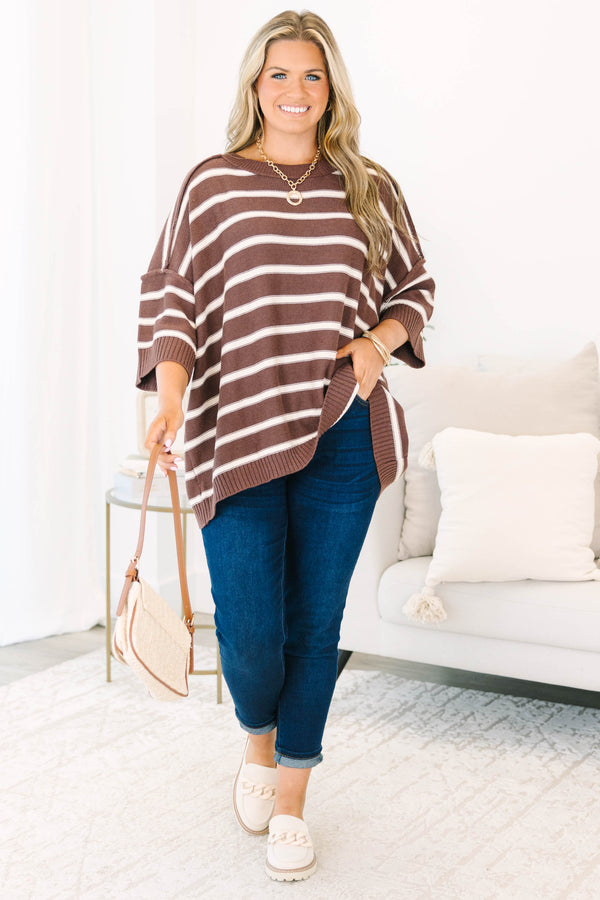 Plus Size brown and white horizontal striped oversized sweater with elbow-length sleeves.