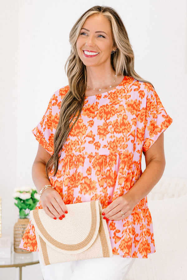 Chic Soul plus size clothing, orange short sleeve babydoll top with a light pink abstract pattern 

