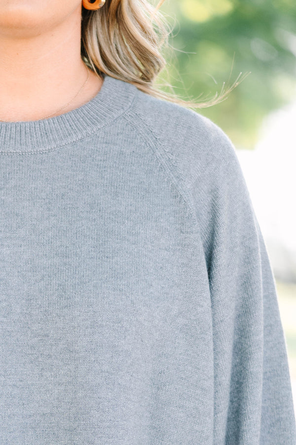 Plus Size gray crewneck sweater with wide three-quarter length sleeves and a ribbed hem.