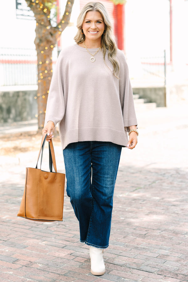 Plus size light mocha raglan sweater with a relaxed fit, crew neck, and flowy elbow-length sleeves.