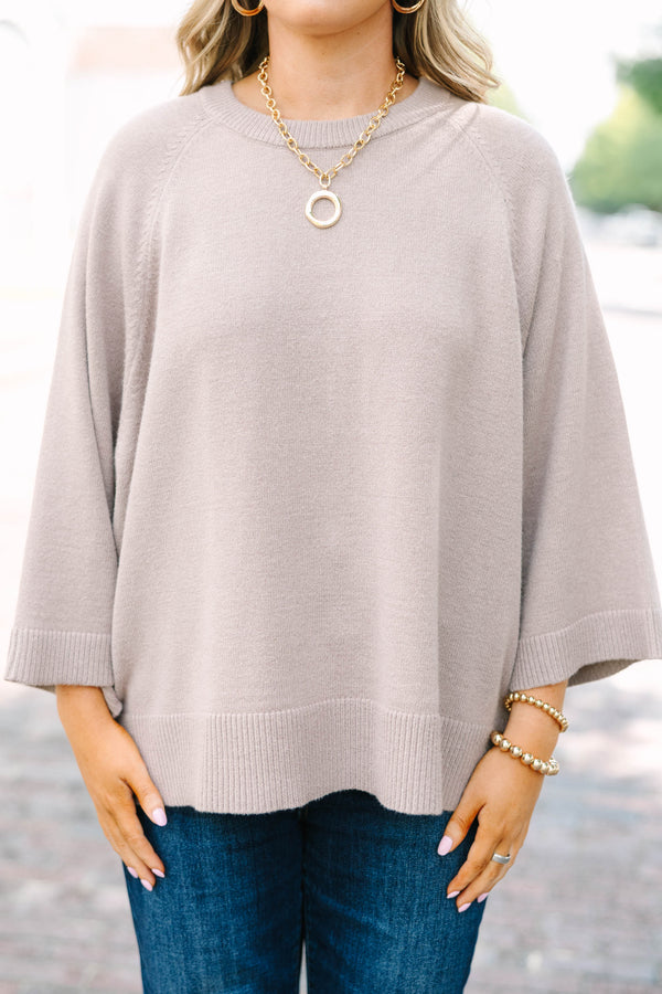 Plus size light mocha raglan sweater with a relaxed fit, crew neck, and flowy elbow-length sleeves.