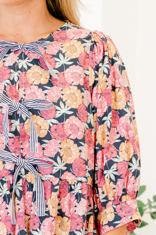 Chic Soul plus size clothing, light pink and orange floral pattern on navy three-quarter balloon sleeve high neck babydoll top with three navy and white pinstripe bows on front