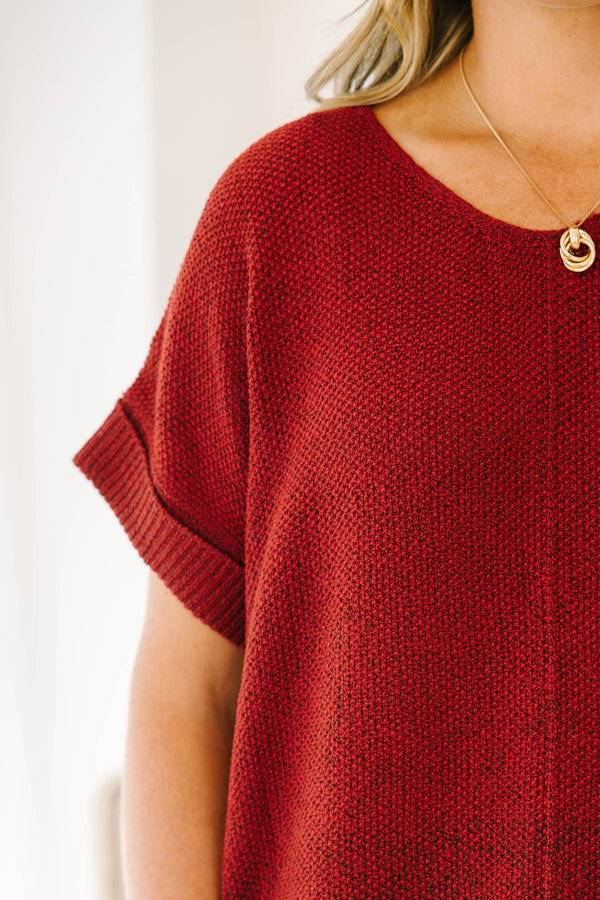 Plus size Cabernet red short sleeve knit sweater with a relaxed fit and ribbed hem.