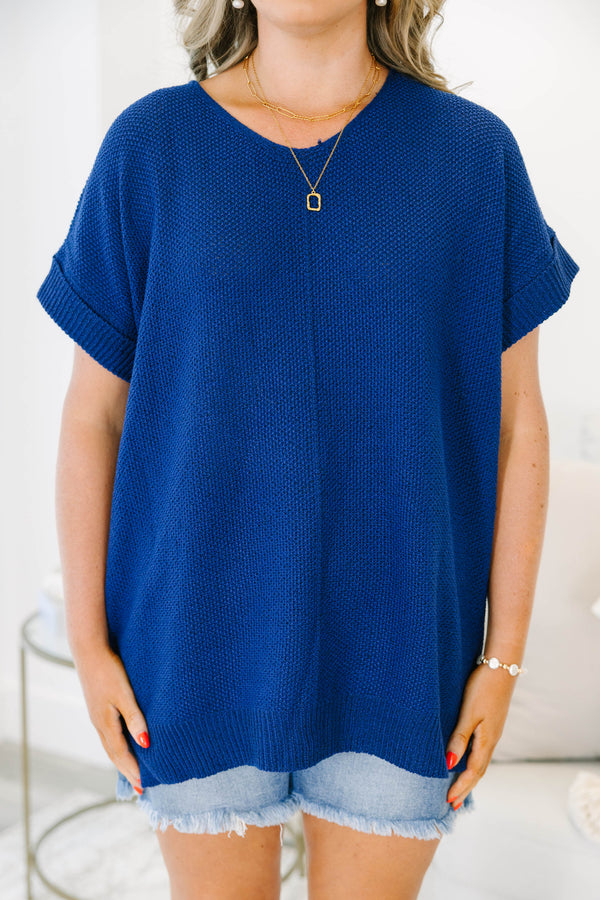Plus size light navy short sleeve sweater with a flowy fit and textured knit fabric.