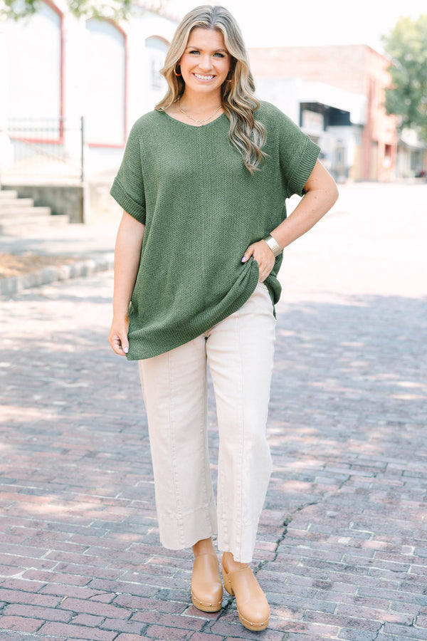 Plus Size light olive short sleeve knit sweater with a round neckline and relaxed fit.
