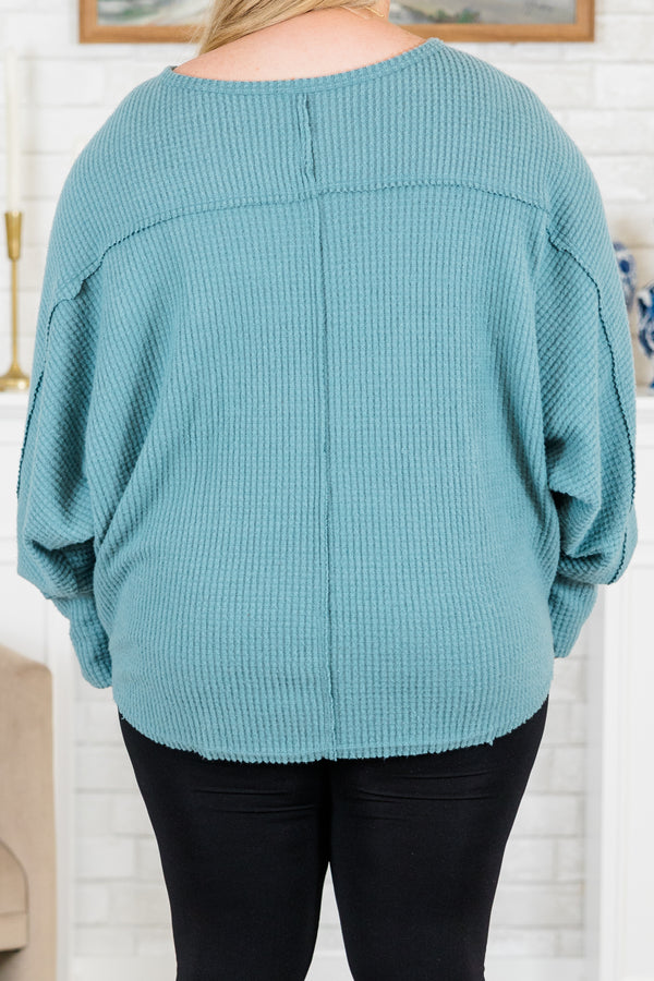 Plus Size slate blue waffle knit long sleeve top with a round neckline and relaxed fit.