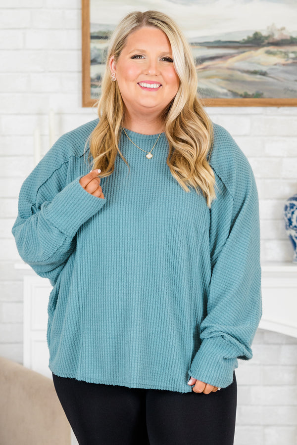 Plus Size slate blue waffle knit long sleeve top with a round neckline and relaxed fit.