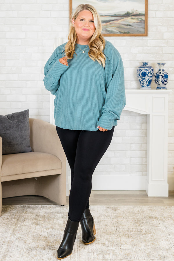 Plus Size slate blue waffle knit long sleeve top with a round neckline and relaxed fit.