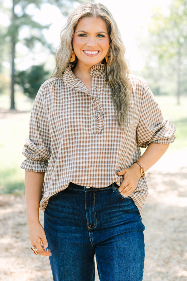 Plus Size brown and white gingham check top with a ruffled collar and button-down neckline.
