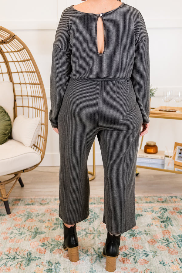 Chic Soul plus size clothing, charcoal long sleeve ribbed knit jumpsuit with cinched waist with tie detail and v neckline with cropped length pants with slight flare