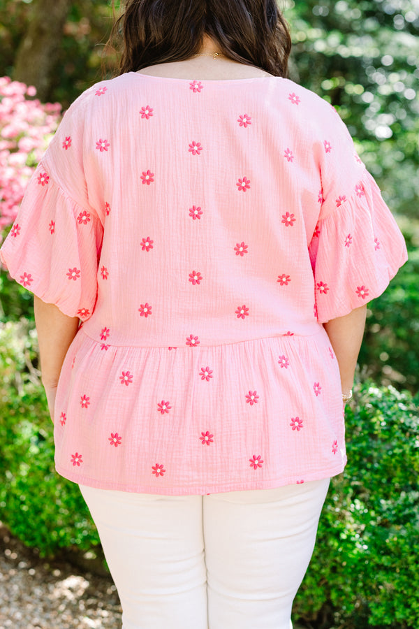Chic Soul plus size clothing, pink short sleeve peplum top with v neckline and puff sleeves with hot pink embroidered flowers