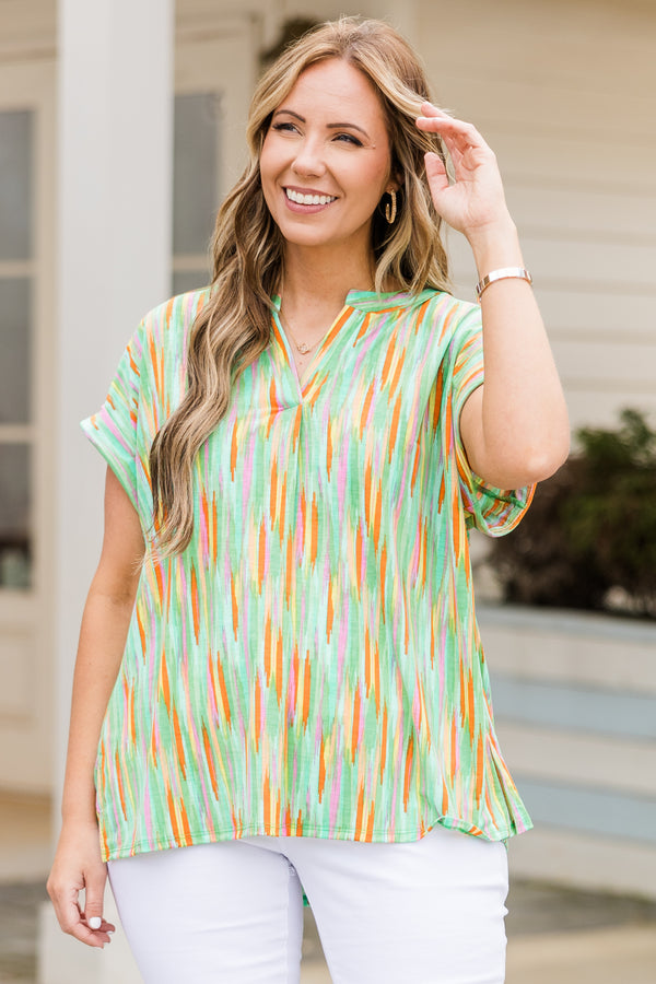 Chic Soul plus size clothing, green top with multicolor paint swatch pattern and a v neck