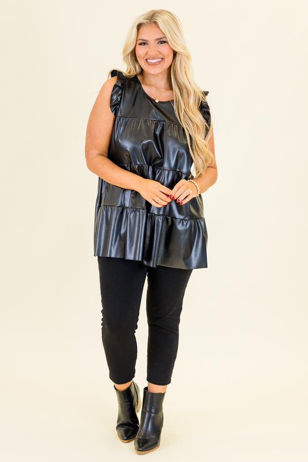 Plus Size black faux leather tiered babydoll top with ruffle shoulder details and a round neckline.