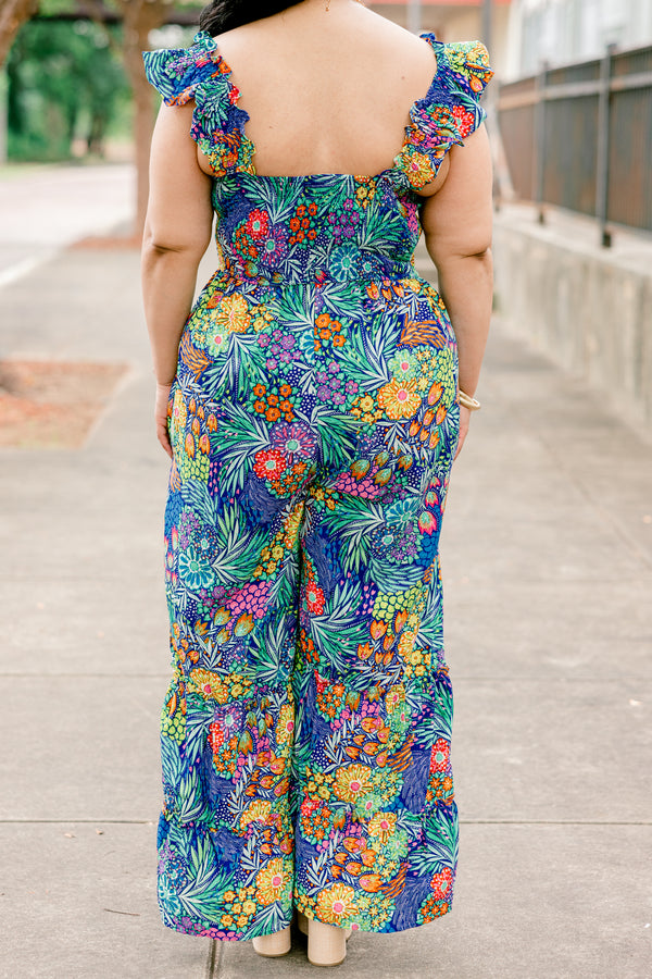 Chic Soul plus size clothing, navy sleeveless jumpsuit with tropical/floral print with square neckline and ruffle straps