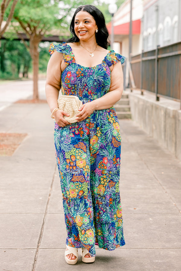 Chic Soul plus size clothing, navy sleeveless jumpsuit with tropical/floral print with square neckline and ruffle straps