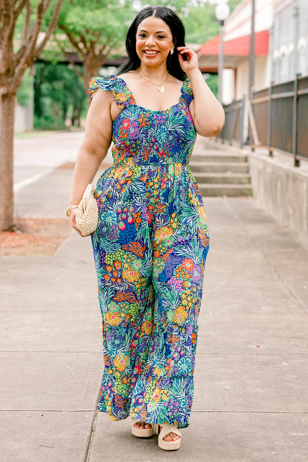 Chic Soul plus size clothing, navy sleeveless jumpsuit with tropical/floral print with square neckline and ruffle straps