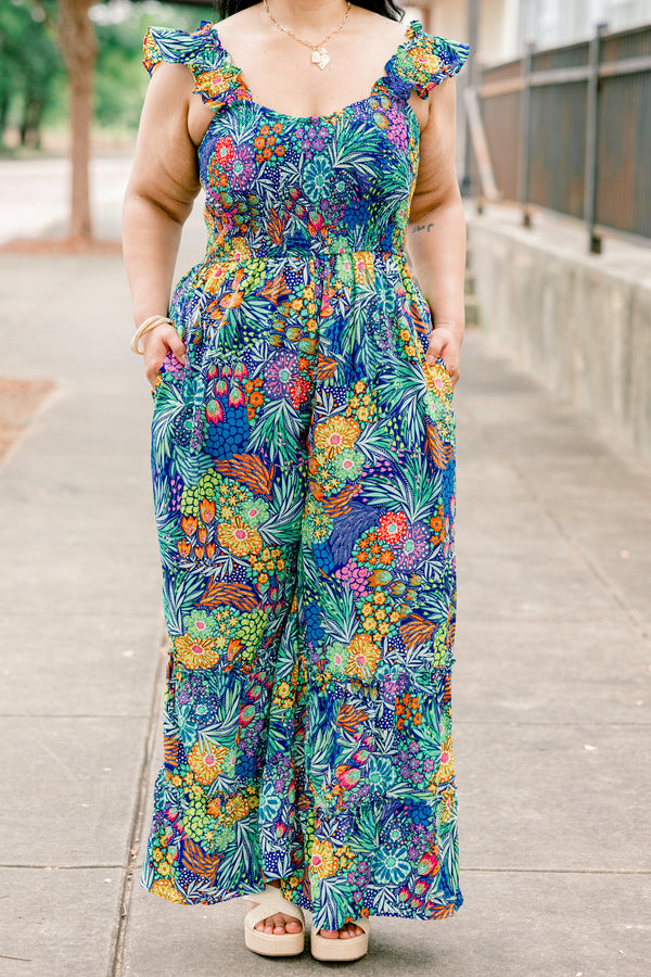 Chic Soul plus size clothing, navy sleeveless jumpsuit with tropical/floral print with square neckline and ruffle straps