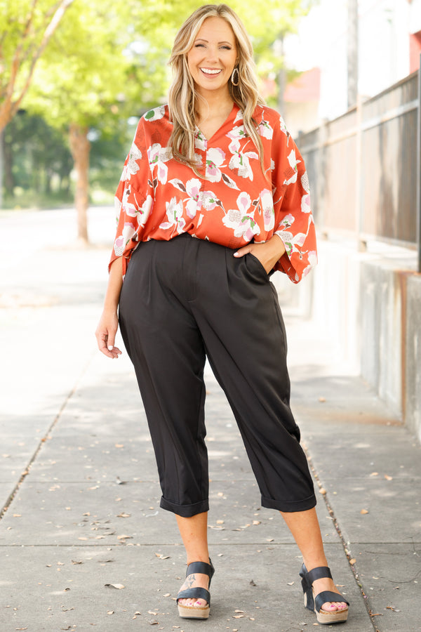 Chic Soul plus size clothing, orange floral pattern flowy top with a v neck and flowy sleeves