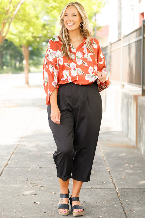 Chic Soul plus size clothing, orange floral pattern flowy top with a v neck and flowy sleeves