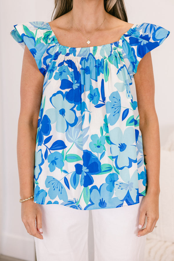 Chic Soul plus size clothing, flutter-short-sleeve blue multi-colored flowy top with a high-square-neckline and a white and blue floral pattern 