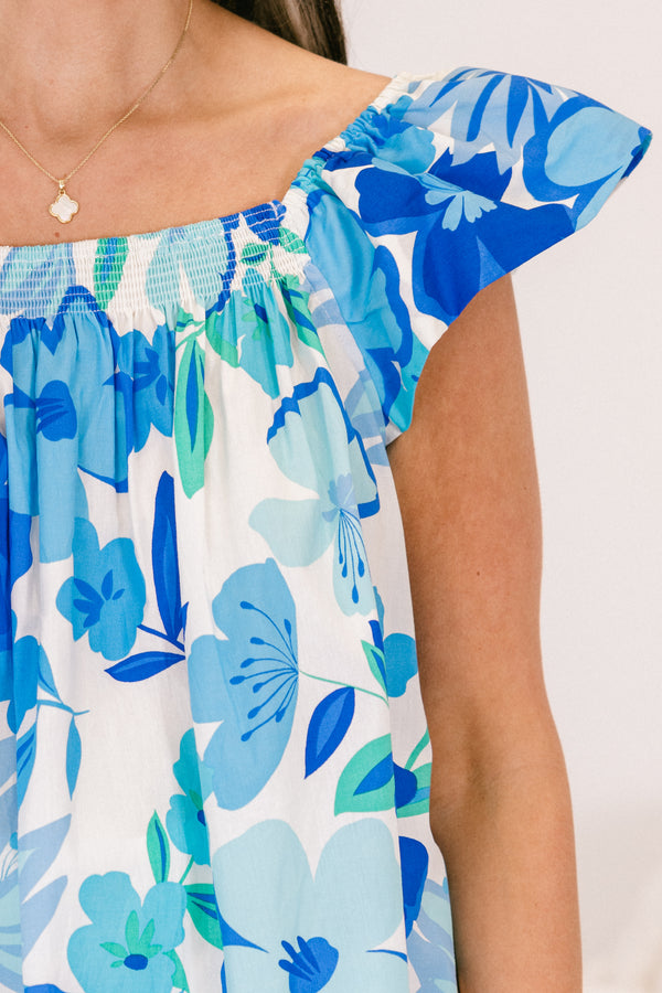 Chic Soul plus size clothing, flutter-short-sleeve blue multi-colored flowy top with a high-square-neckline and a white and blue floral pattern 