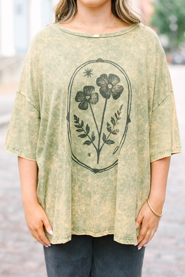 Plus Size golden olive acid wash oversized tee with a vintage floral graphic and crew neckline.