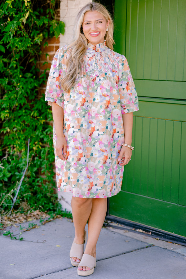 Chic Soul plus size clothing, pink multi colored short sleeve dress with an abstract floral pattern a high neck and a ruffle detailed collar 